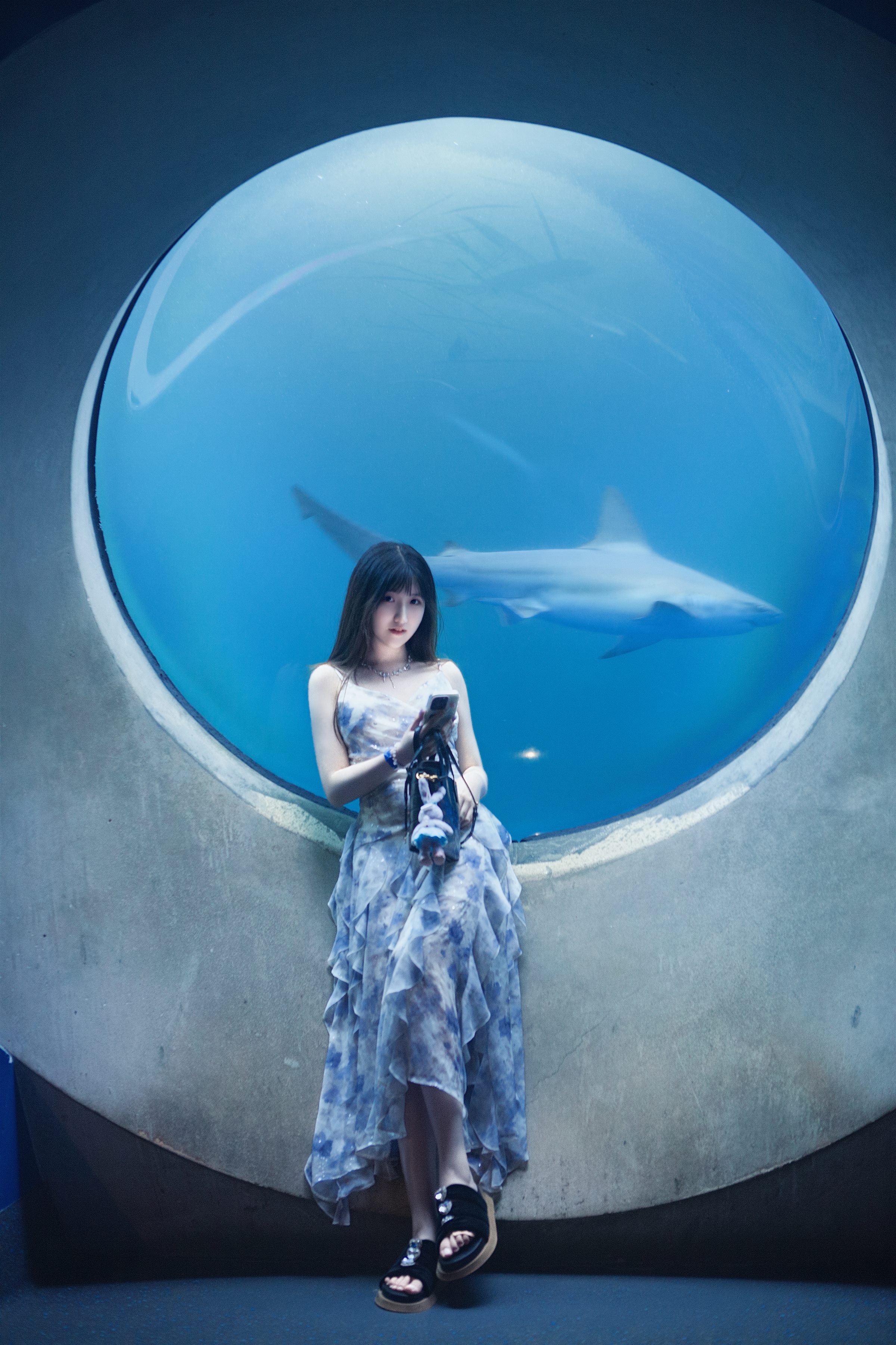 Portrait beside the aquarium window aboard the cruise ship