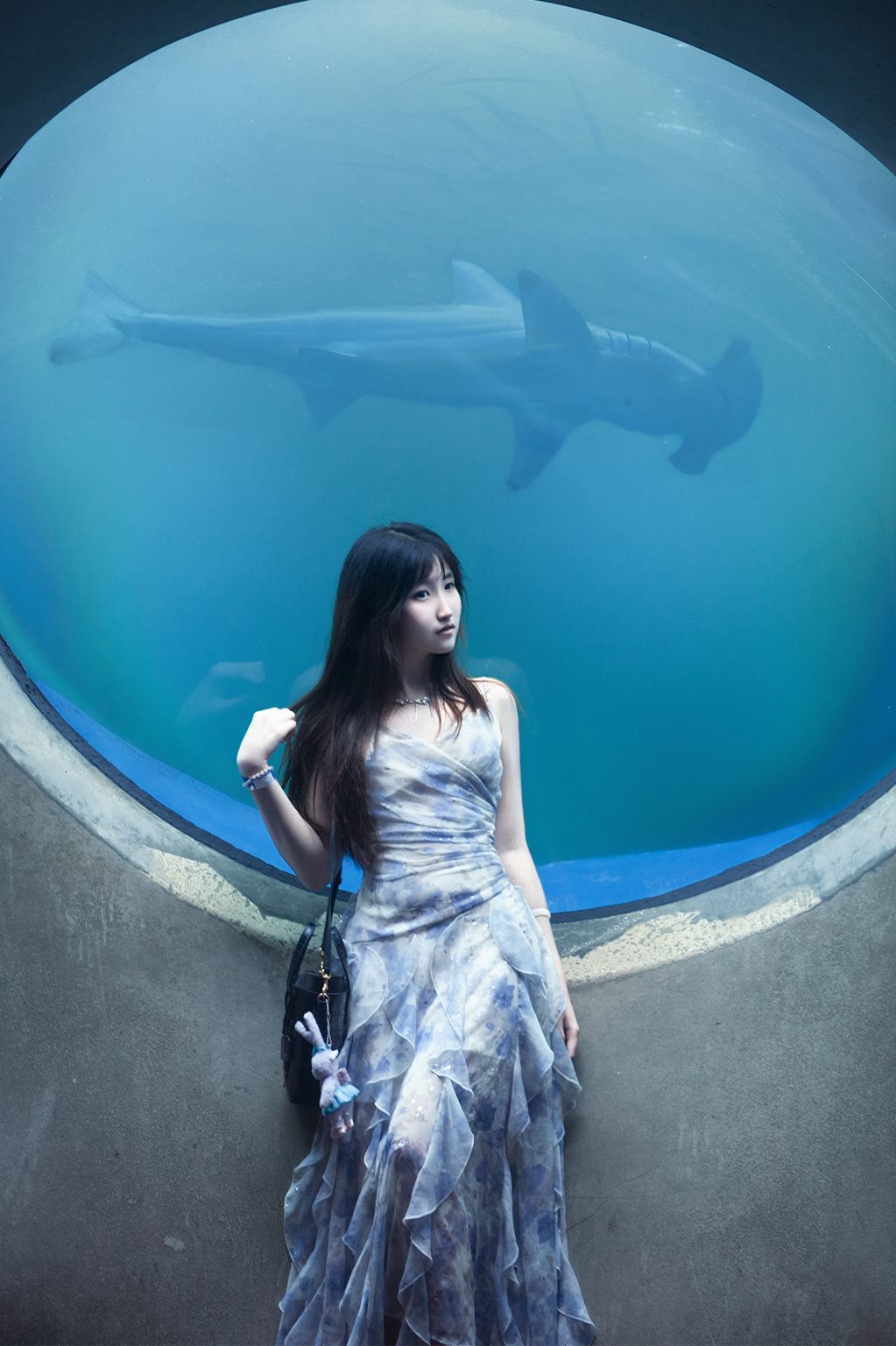 Second portrait beside the aquarium window