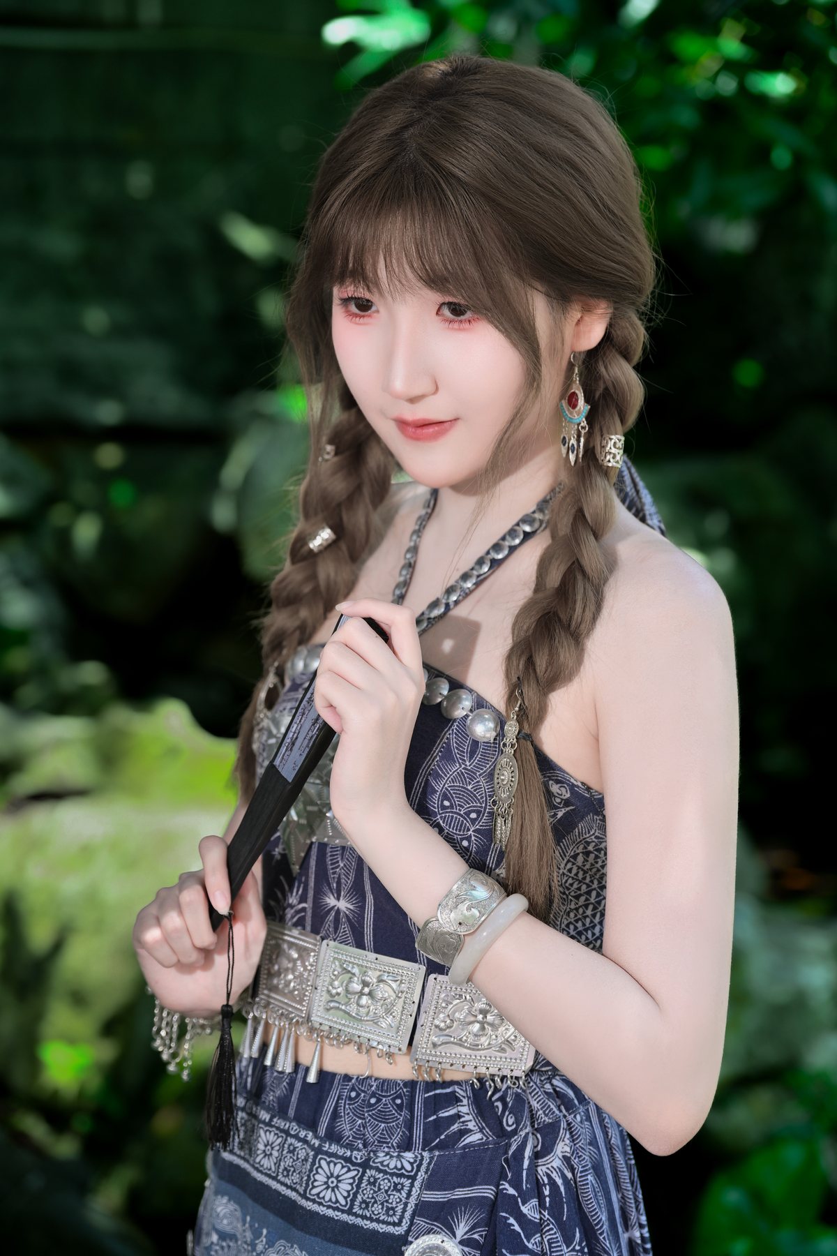 Close portrait of Cici in green garden light