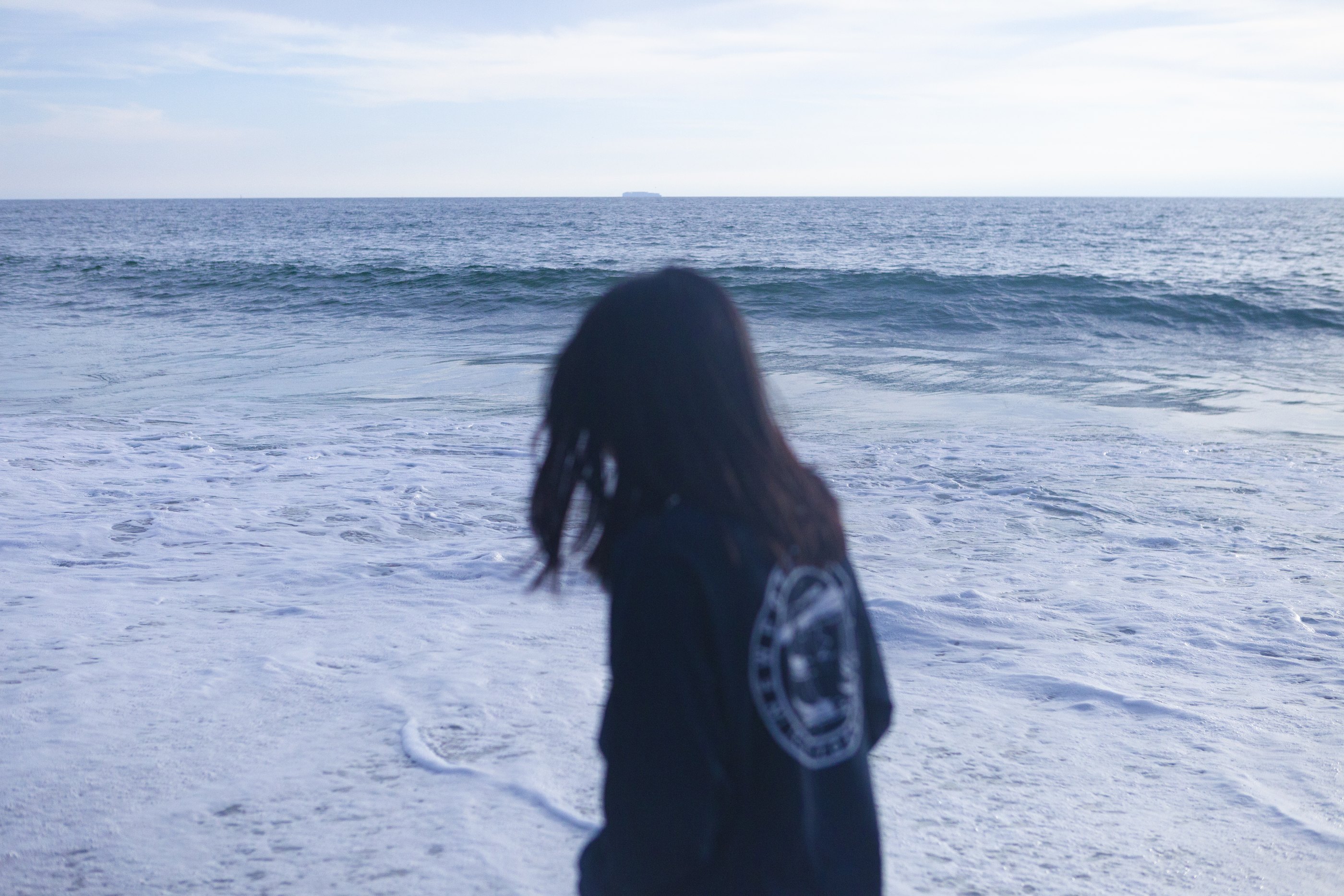 Cici looking over the Pacific Ocean in Los Angeles